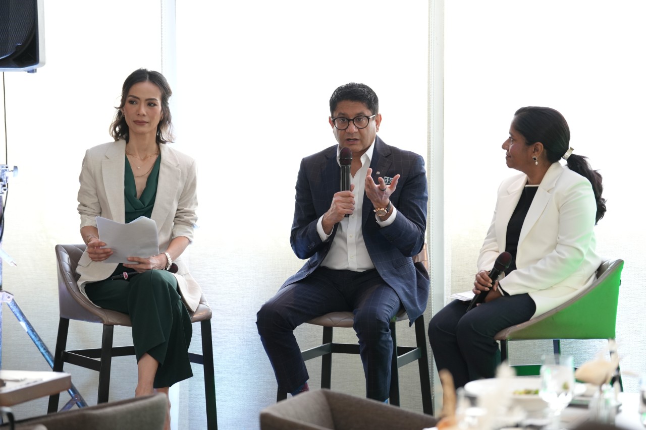 Manulife Philippines executives attend a media luncheon 